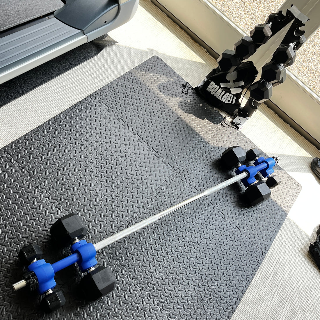 Effortlessly Attach Your Dumbbells To A Bar With Dualbell