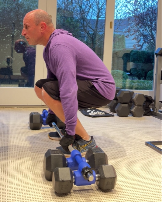 Performing Deadlifts with Dualbell Dumbbell Converters