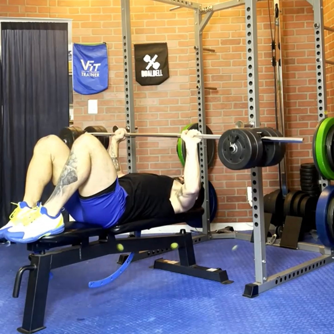 bench press barbell exercises using dumbbells as weight plates