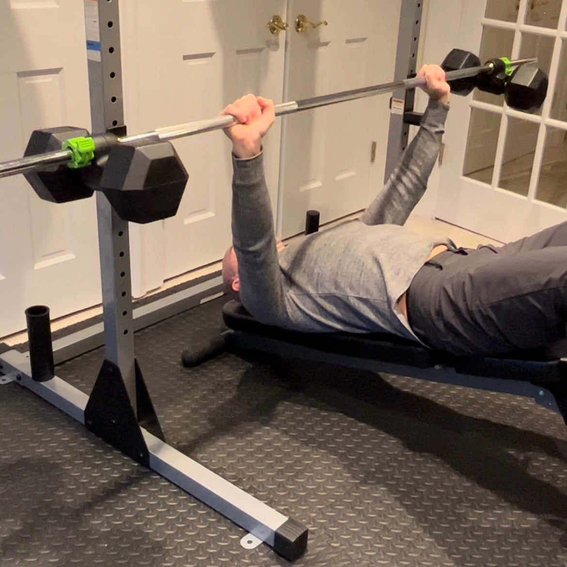 Decline bench press using the dumbbells loaded into the  Dualbell Pair
