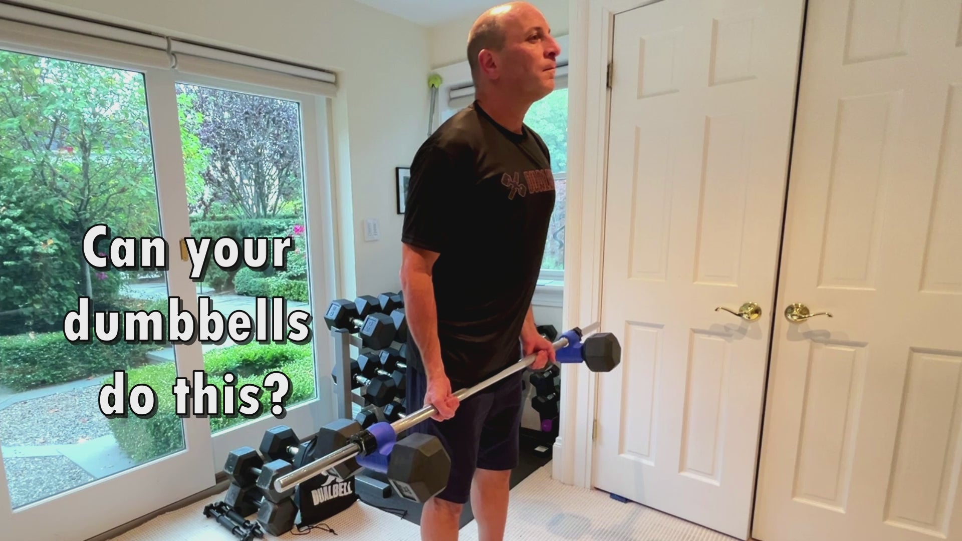 Load video: Dualbell dumbbell to barbell converters shown being used in home gym for exercises, bicep curls squat, shoulder press, deadlift bench press.